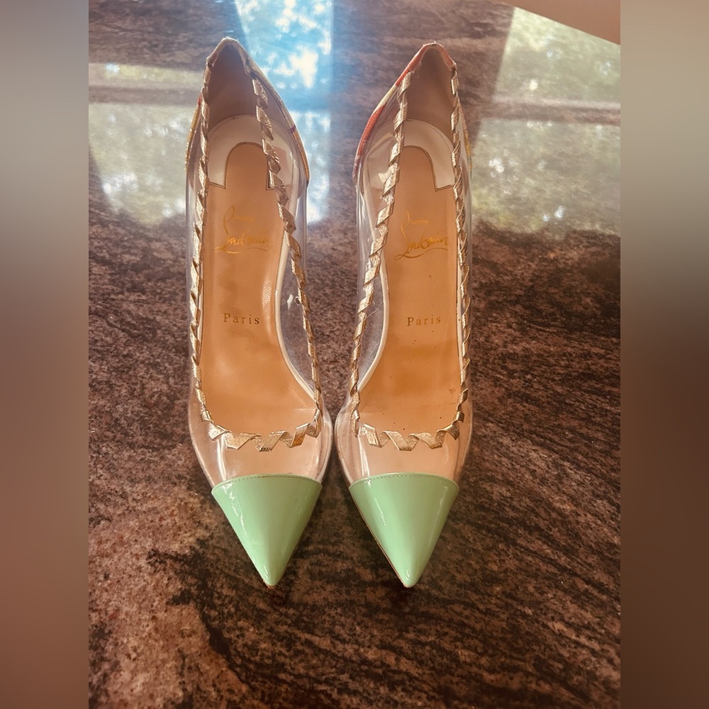 With COA CHRISTIAN LOUBOUTIN
